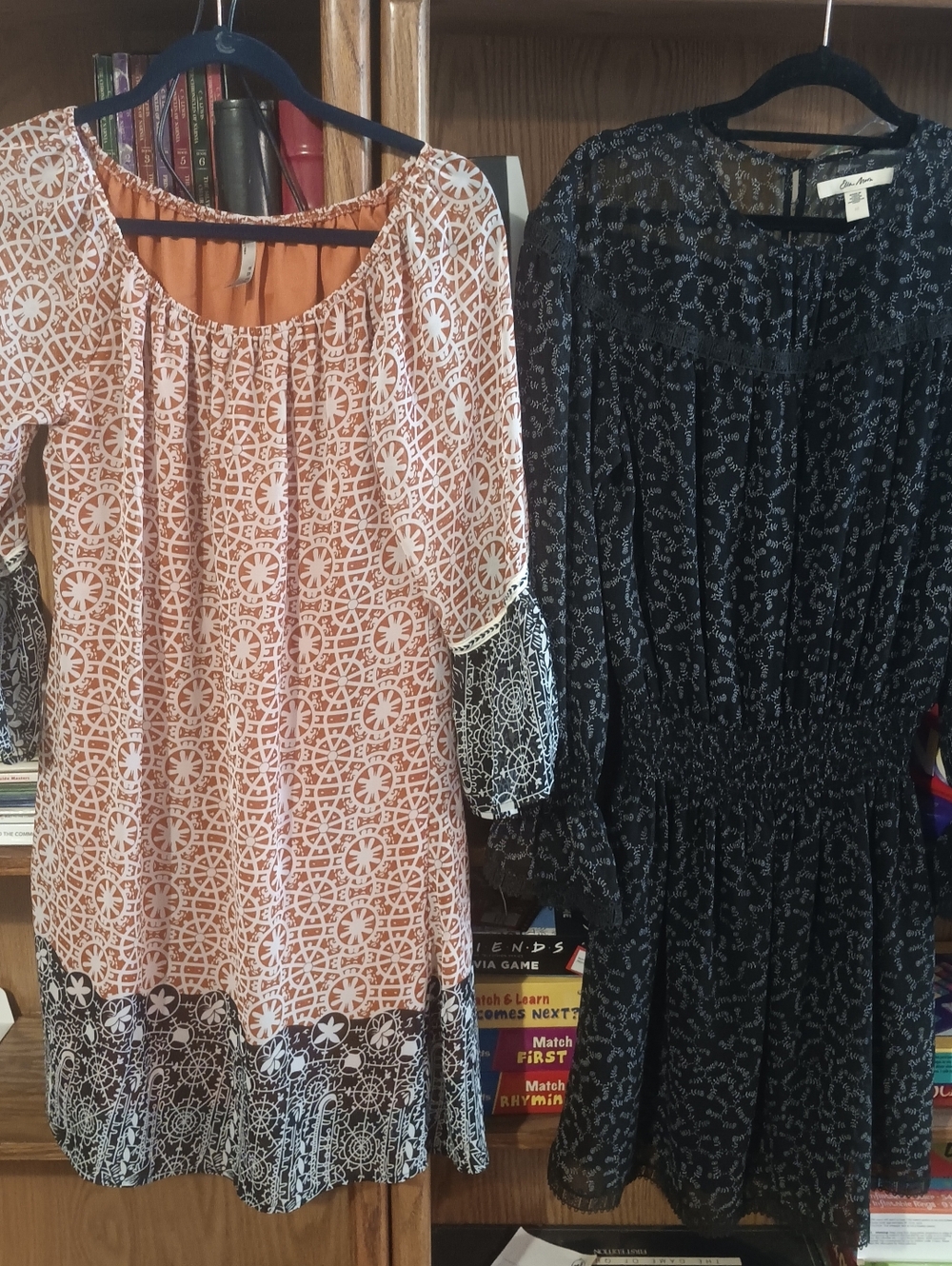 Orange And Black Patterned BoHo Dress And Black And Grey Patterned Dress